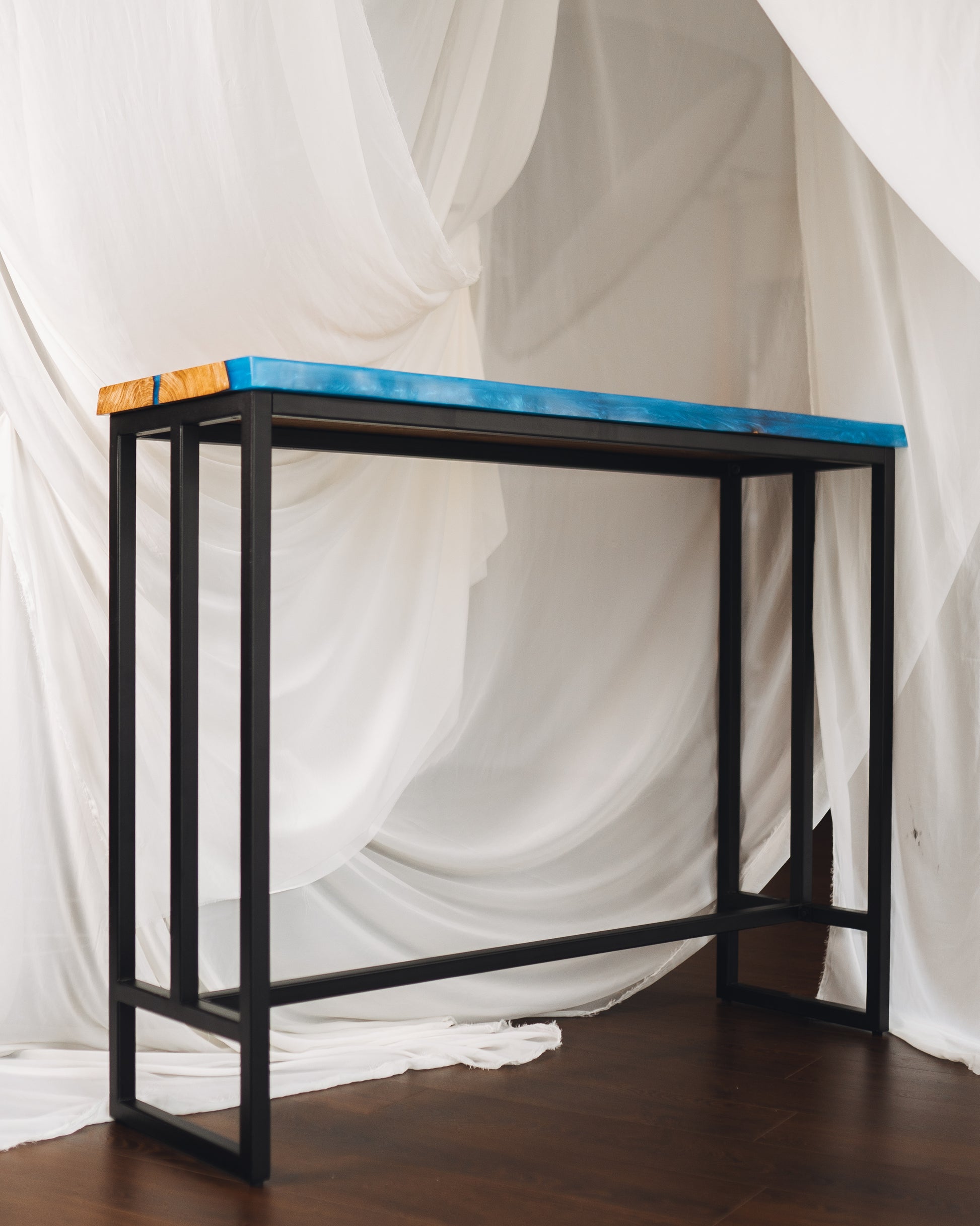 Bar table — powder-coated steel legs close-up